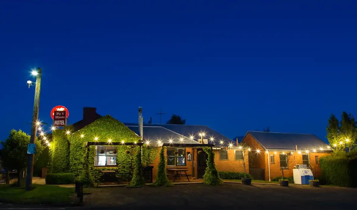 The candlelit main dining hall at dusk